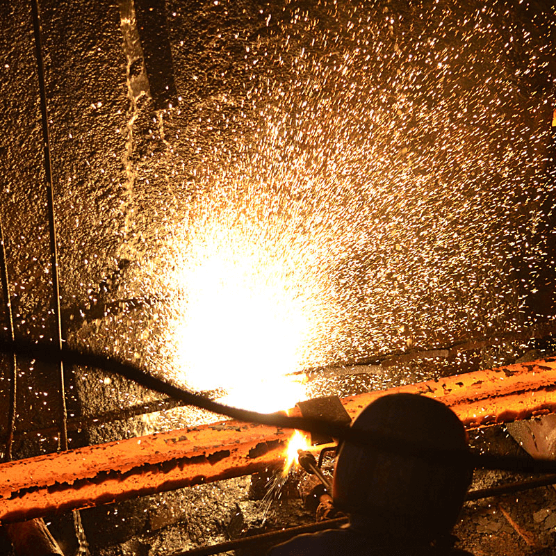 Industrial photography shot by SpotMedia in Velachery, capturing metal cutting machinery and manufacturing processes.